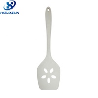Spatule de cuisine multifonctionnelle en silicone monobloc, résistante à la chaleur, à fentes, motif floral, couleur personnalisable, pour usage domestique et en cuisine
