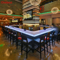 Comptoirs de restaurant modernes en pierre translucide Corian à LED, en forme de U, pour buffet et bar