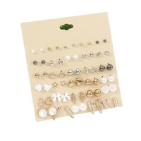Ensemble de boucles d'oreilles tendance, design fleur, étoile de mer, papillon, en alliage, clous et pendantes, pour femmes, bijoux de luxe léger, vente en gros