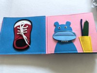 Tableau sensoriel en feutre pour bébé, livre d'activités silencieux, livre d'activités Montessori, jouet éducatif en tissu OEM pour la maternelle et les voyages