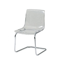 Chaise de loisirs de luxe en plastique ambre transparent avec base chromée