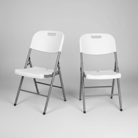 Chaise pliante portable moderne en plastique blanc et noir pour mariages, restaurants, événements, camping en plein air, écoles et parcs (vente en gros)