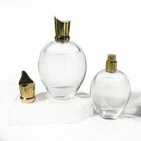 Bouteille en verre de forme unique de haute qualité bouteille de parfum vide 30ml 50ml 75ml 100ml boîte cosmétique transparente bouteille de parfum en verre