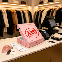 Boîte d'expédition pliante en carton ondulé rose personnalisée pour vêtements, idéale pour les boutiques de mode