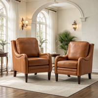Fauteuil de salon de luxe en cuir véritable avec détails cloutés, dossier haut et accoudoirs incurvés pour la maison et le bureau