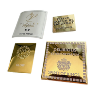 Étiquettes personnalisées en aluminium gaufré 3D pour flacons de parfum, écologiques et de haute qualité.