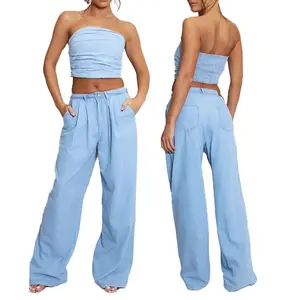 Yüksek kaliteli özel rahat Fit moda kadınlar Denim Suit pileli Denim Bandeau üst ve Flare kot mavi Set