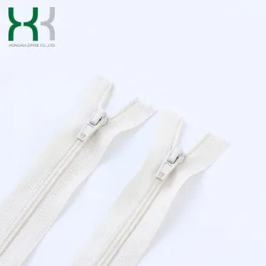 Bền vững nickel-miễn phí màu xanh/wite khả năng chịu nước vô hình 5 # nylon dây kéo với tự động trượt kéo khóa cho quần áo