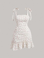 Robe asymétrique sans dos en dentelle à imprimé floral, longueur genou, avec bretelles spaghetti et ourlet à volants