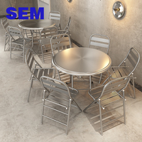 Ensemble table et chaises pliantes portables en acier inoxydable SEM Wholesale, style industriel, pour hôtel, café, restaurant extérieur.