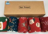 Chaussettes de Noël chaudes pour femmes, en polaire douce, avec semelles antidérapantes, idéales pour les fêtes, en lot cadeau