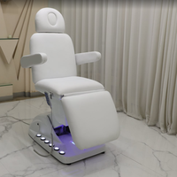 Lit de soin esthétique électrique à 3 moteurs avec commande au pied, fauteuil facial réglable avec base lumineuse LED pour esthéticiennes, spas et studios de cils