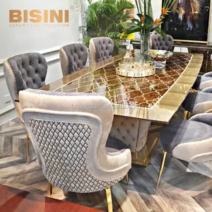 Mesa de comedor larga con incrustaciones de marquetería de acero inoxidable de estilo europeo, diseño único, con 8 sillas