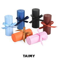 Boîtes d'emballage de bijoux en gros, portables, en cuir PU, pour bagues, avec logo personnalisé, cylindriques, avec ruban de satin, pour mariage et fiançailles