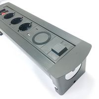 Prise de courant USB a + 3 EU USB-C intégrée dans la table de conférence Prise rotative motorisée rabattable avec chargeur sans fil inséré