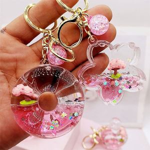 Porte-clés dessin animé cerisier et beignet, porte-clés liquide sable mouvant Sakura, pendentif de voiture, accessoires de sac, cadeaux pour enfants - Product Image 3