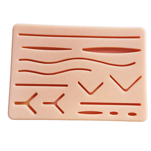 Almohadilla de silicona para sutura de heridas con 14 cortes, modelo de entrenamiento de sutura quirúrgica, modelo de piel humana traumática con cortes predefinidos - Product Image 2