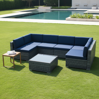Ensemble de canapés modulaires d'extérieur en rotin PE, en forme de L, avec coussins bleu marine et table basse en verre, 5 pièces