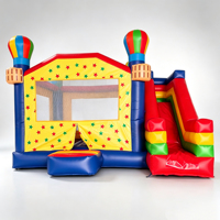 Château gonflable commercial avec toboggan intégré pour parc d'attractions, aire de jeux et événements