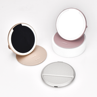Miroir cosmétique portable circulaire pliable en métal avec cadre en cuir, lumière LED rechargeable, un seul côté, logo personnalisé