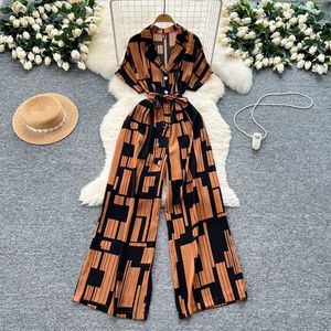 Combinaison décontractée imprimée à col revers et manches courtes, taille nouée, jambe large, style vacances pour femme - Tendance - Product Image 5