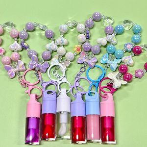 Huile à lèvres changeante de couleur en gros à prix réduit, marque privée, brillante et scintillante, huiles à lèvres transparentes et pailletées - Product Image 3