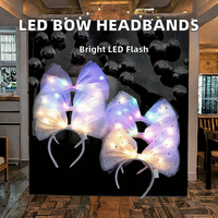 Bandeau de Noël à prix d'usine avec lumières LED colorées Décorations de fête pour femmes et filles Accessoires pour cheveux à grand arc