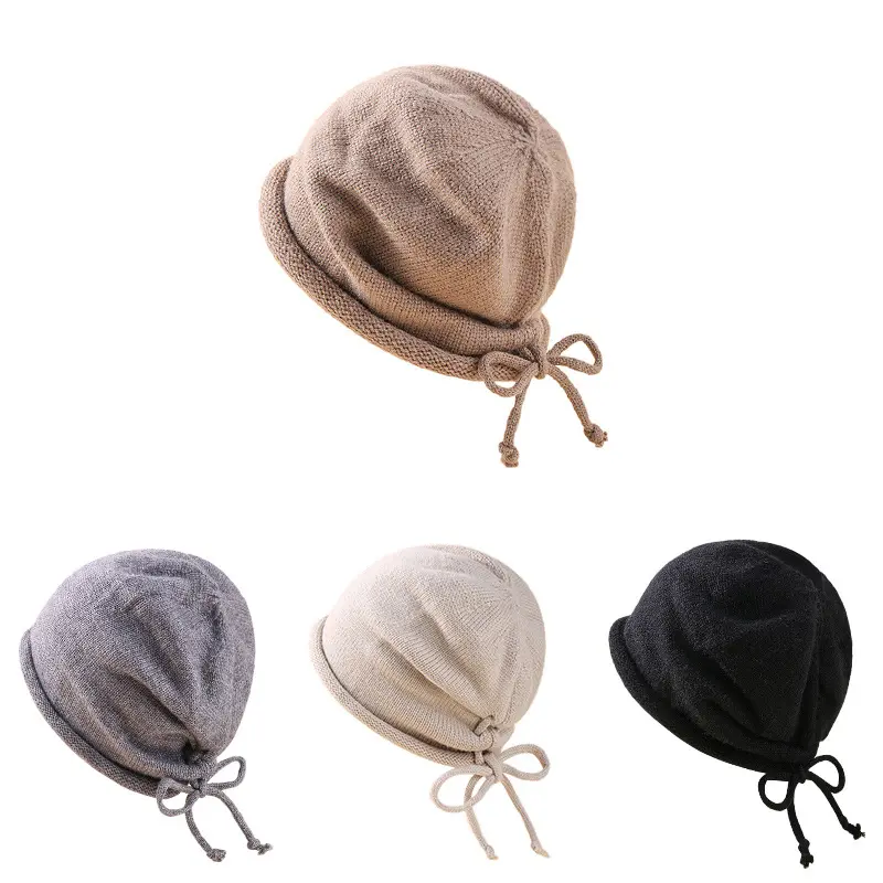 Q31205 Edge Rope Tassel solid Pullover Knitting Hat Women Knitting Drawstring Skull Beanies hats Winter Cap