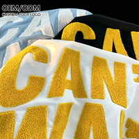 T-shirt en coton épais à col rond imprimé numériquement, avec logo brodé en chenille 3D, à manches courtes pour homme