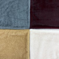 Tissu en peluche tricoté 100 % polyester cationique à poils longs et courts de haute qualité pour vêtements, manteaux, couvertures et literie