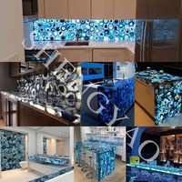 Comptoir de bar d'hôtel de luxe à arc circulaire rétro-éclairé agate en cristal bleu naturel bureau de réception en pierre translucide