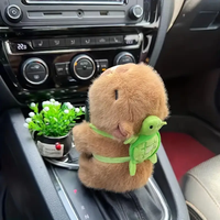 Vente en gros fabricant : Jouets en peluche Capybara avec sac à dos tortue, animaux en peluche interactifs à câliner, bracelets animaux en peluche.