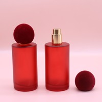 Bouteille de parfum en verre dépoli rouge ronde de luxe de 50ml bouteille vide en forme de cylindre avec emballage en boîte