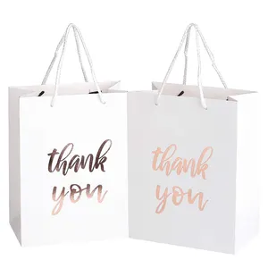 Moda alışveriş çantaları gül altın folyo baskı çevre dostu hediye paketleme karton kağıt taşıma torbaları Logo baskılı