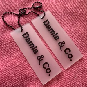 company logo frosted surface transparent PVC swing tag,environmental 3D raised logo clear silicone rubber hang tag