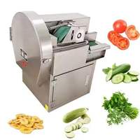 Kleine industriële automatische fruit- en groentesnijmachine met motor voor het snijden van bananen, tomaten, chilipepers en prei.