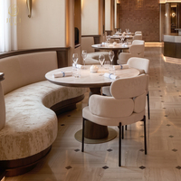 Ensemble de mobilier commercial JEILI pour restaurants : banquettes rembourrées, tables rondes et chaises pour projets hôteliers et d'accueil.