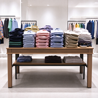Présentoir de Vêtements pour Magasin : Table Îlot en Bois, Porte-vêtements en Métal Noir, Étagères, CE ETL, Vente en Gros pour Boutiques