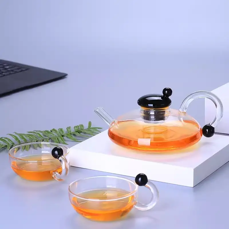 उच्च बोरोसिलिकेट ग्लास चायदानी सेट फिल्टर चाय हैंडल अंडाकार ग्लास चायदानी के साथ