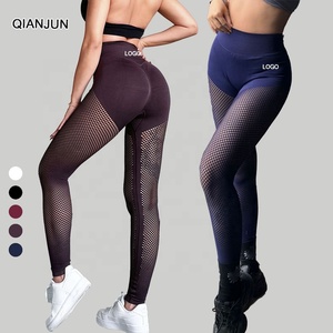 Leggings de <span class=keywords><strong>yoga</strong></span> en nylon sans couture <span class=keywords><strong>Sexy</strong></span> taille haute évidée pantalon de sport bout à bout avec motif solide pour les femmes - Product Image 1