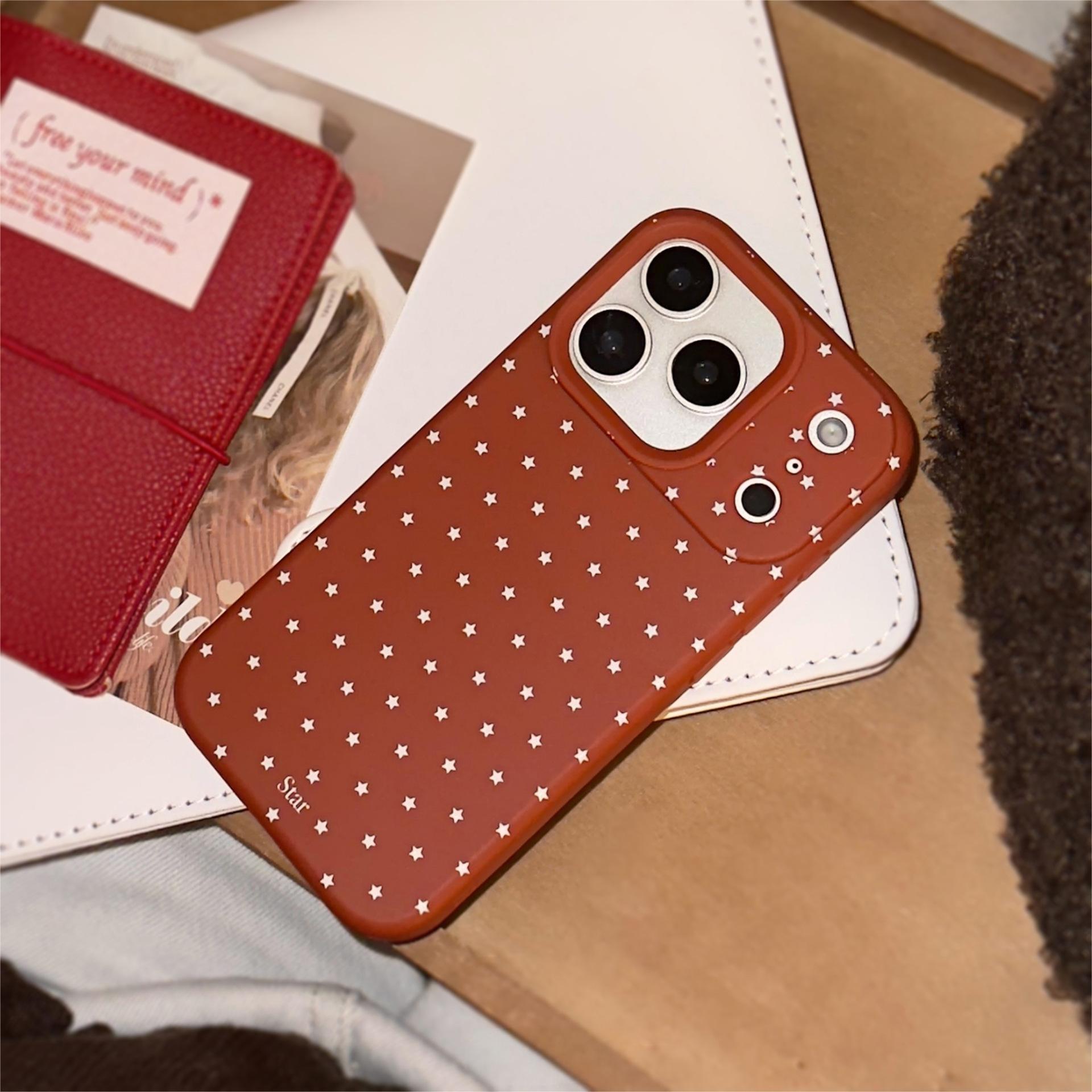 Caramel red, white shattered stars fill the screen