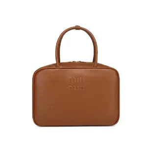 부드러운 가죽 간단한 베개 가방 2024 새로운 패션 숄더 스트랩 볼링 가방 대용량 핸드 헬드 원 숄더 크로스 바디 백
