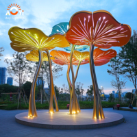 Sculpture géante personnalisée en métal en forme de feuille de lotus, lumineuse et durable, pour l'aménagement paysager extérieur de Noël, idéale pour les places municipales et les sites touristiques.