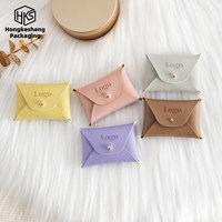 Pochette à bijoux en cuir PU avec bouton-pression, sac de rangement pour bijoux en cuir de luxe léger, sac d'accessoires avec logo estampé à chaud