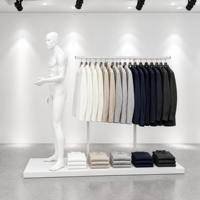 Présentoir de vêtements autoportant blanc à deux poteaux avec base de mannequin pour aménagement de boutique