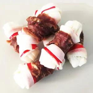 MERIENDA PARA MASCOTAS MARCA OEM 100% ALIMENTOS NATURALES SIN GRANO ALTA PROTEÍNA BAJA HUMEDAD PIEL ROJA PATO SECO CON 2,5 '4,5' DINGO 2P/5P/65g - Product Image 1