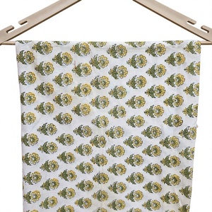 Premium White Pure Cotton <b>Fabric</b> Featuring Traditional Hand Block Print Yellow Floral Motifs And Green Leaves Running Material - Product Image 1