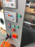 Enrouleur automatique pour machine à rouler le film plastique, machine à enrouler les étiquettes