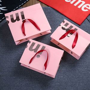 Sacs en papier cadeau modernes de luxe, impression UV, logo personnalisé, différentes couleurs, sacs de shopping en gros avec poignée pour les petites entreprises - Product Image 6