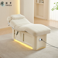 Mobilier commercial : Lit de massage et de beauté motorisé avec éclairage coloré et prise électrique pour salon de beauté